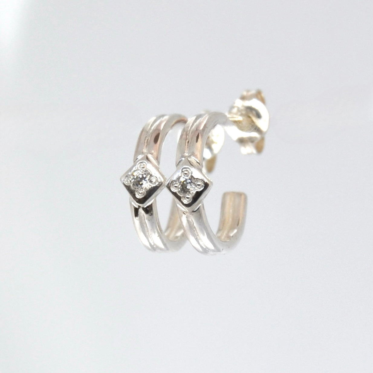 Space Between Huggie Hoop • Silver